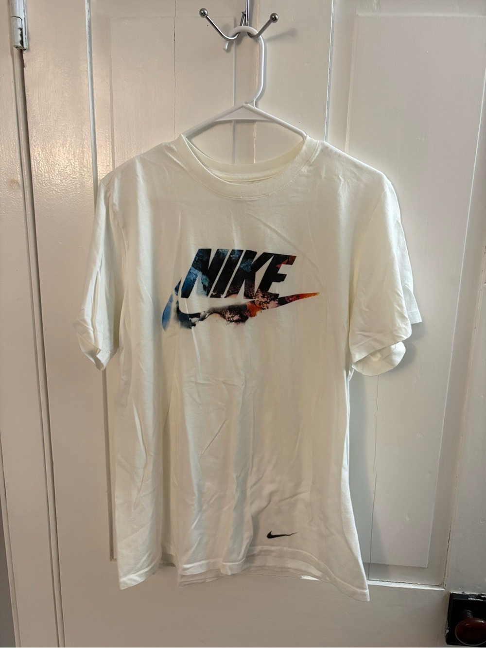 Nike White Short-Sleeve Tee with Multicolor Swoosh Graphic